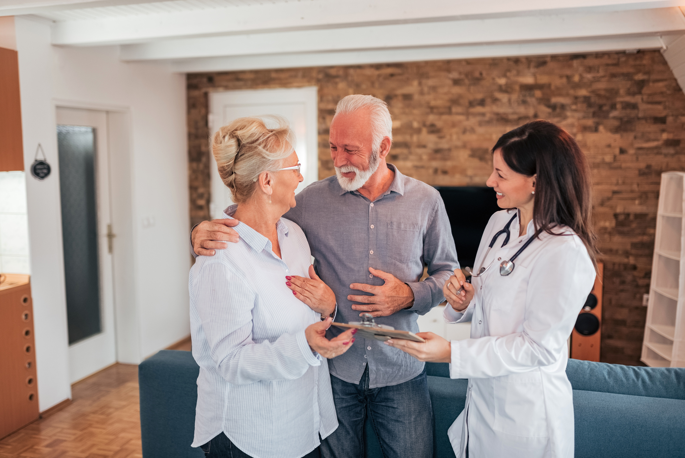 Older couple talking with a healthcare provider
